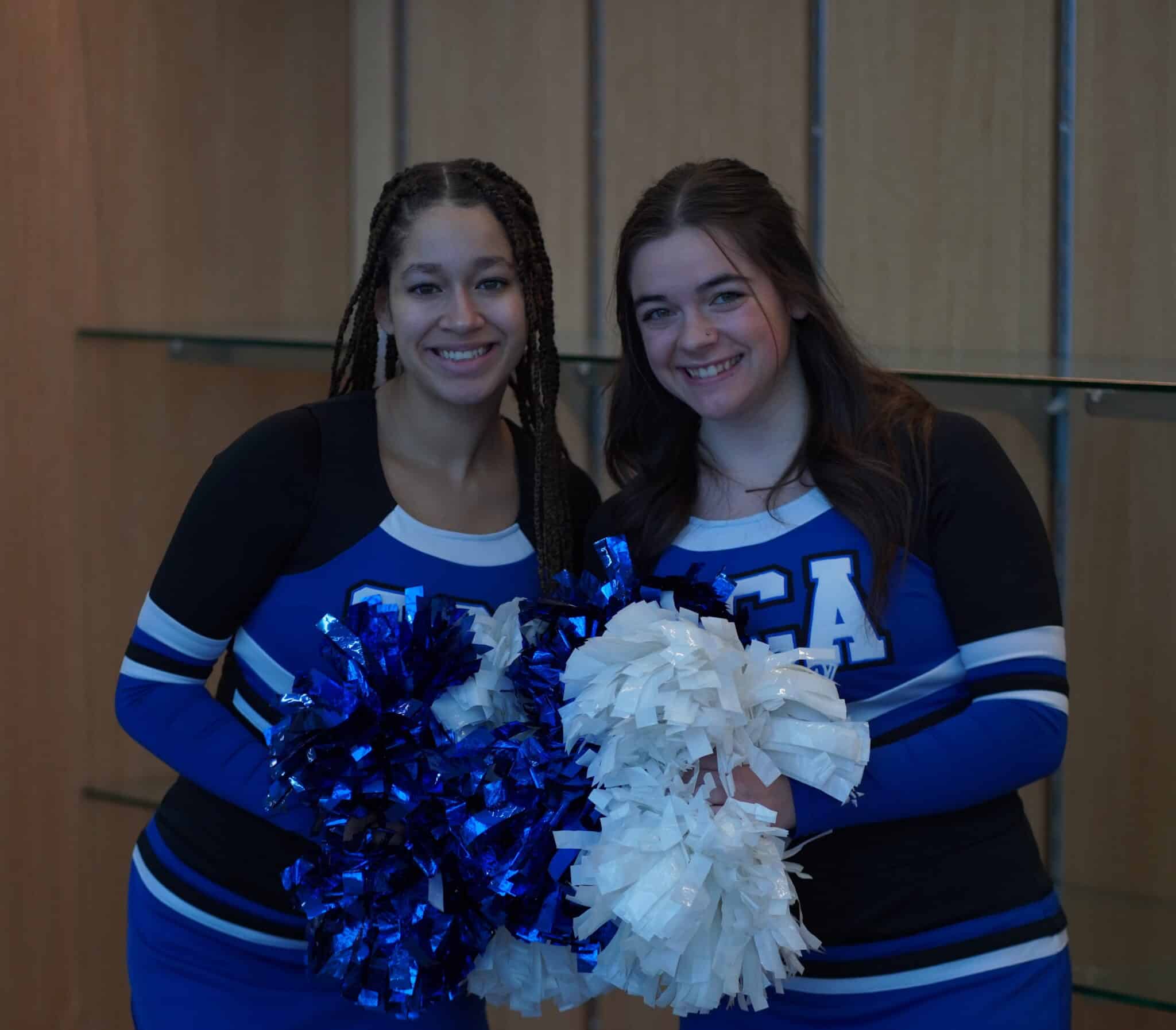 SCA Varsity Cheerleaders seniors Liv Collum and Alivia Addleman join in the celebration of the SCA Fieldhouse and Activity Center.