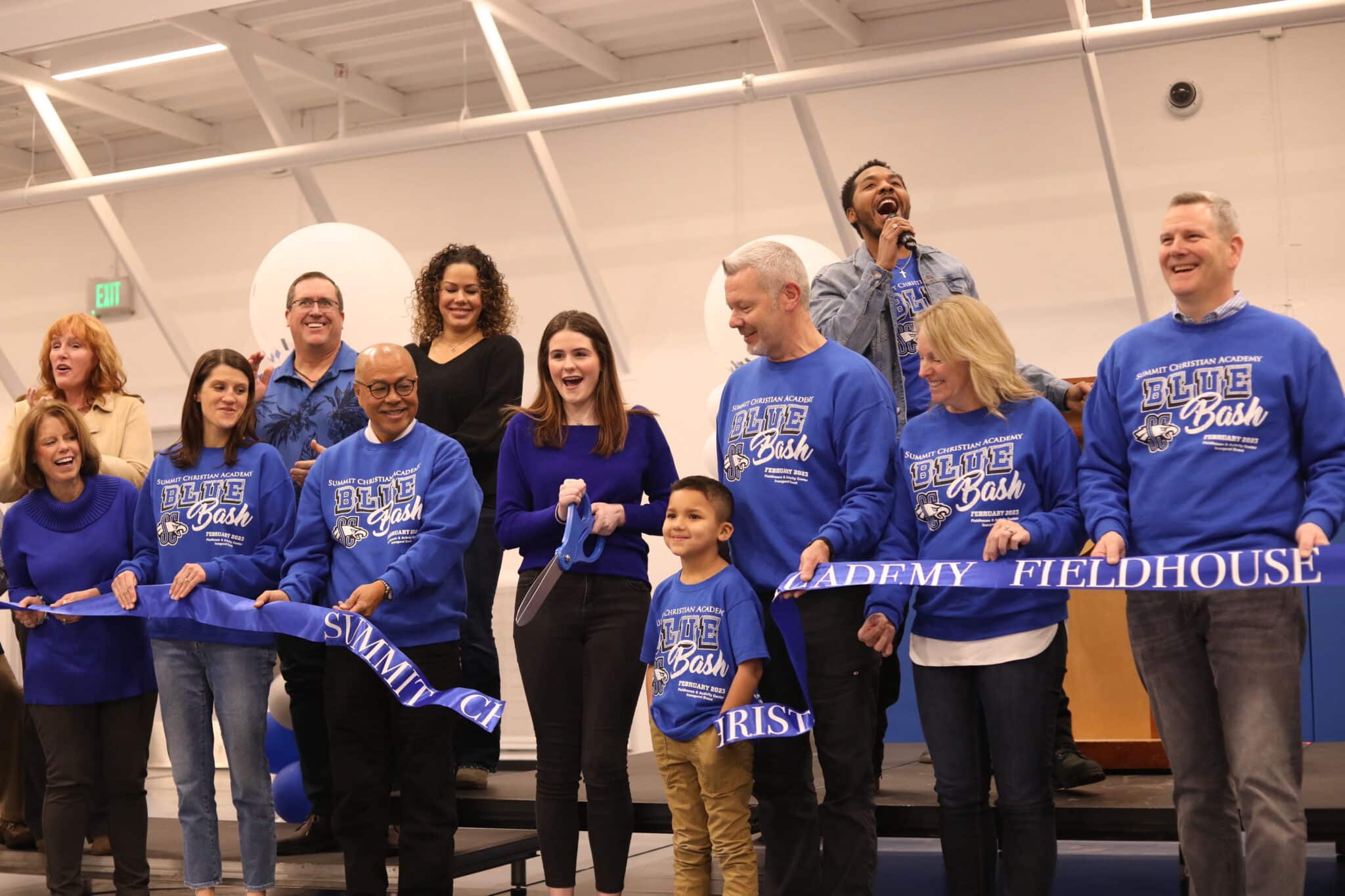 Summit Christian Academy hosted the Fieldhouse & Activity Center Ribbon Cutting on February 9. The 43,000 ft² Fieldhouse, includes an official NCAA sized gymnasium that seats 1200, lockers rooms, a strength and conditioning room, a multipurpose room, a concession stand, restrooms and athletic offices. Pictured here: (back row) Alumni SCA parent Desta Oppriecht, SCA parents Doug and Mirtha Galant, and SCA 2010 Alumnus, SCA School Board Member, and Abundant Life Pastor Toshaun Avery. (front row) SCA former Head of School Linda Harrelson, SCA Board of Education members Jodi Butler and Fel Bagunu, SCA Student Council President senior Madison Brown, SCA Student Representative kindergarten student Isaiah Bagunu, SCA Board of Education member Tim Wiseman, Rebecca Wiseman, and SCA Board of Education President Don Bisbee.