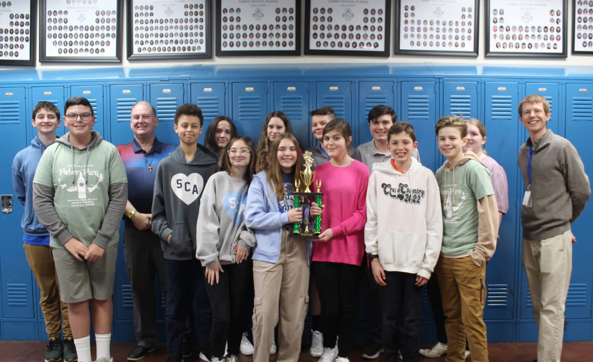 The SCA Junior High Speech & Debate team, pictured with High School Speech & Debate Coach Bill Lindsey and Junior High Speech & Debate Coach Patrick Love, has earned the right to compete at the National Speech and Debate Association Middle School tournament in Phoenix, Arizona. Pictured here, the team took 1st place at the Ray-Pec South Middle School tournament.