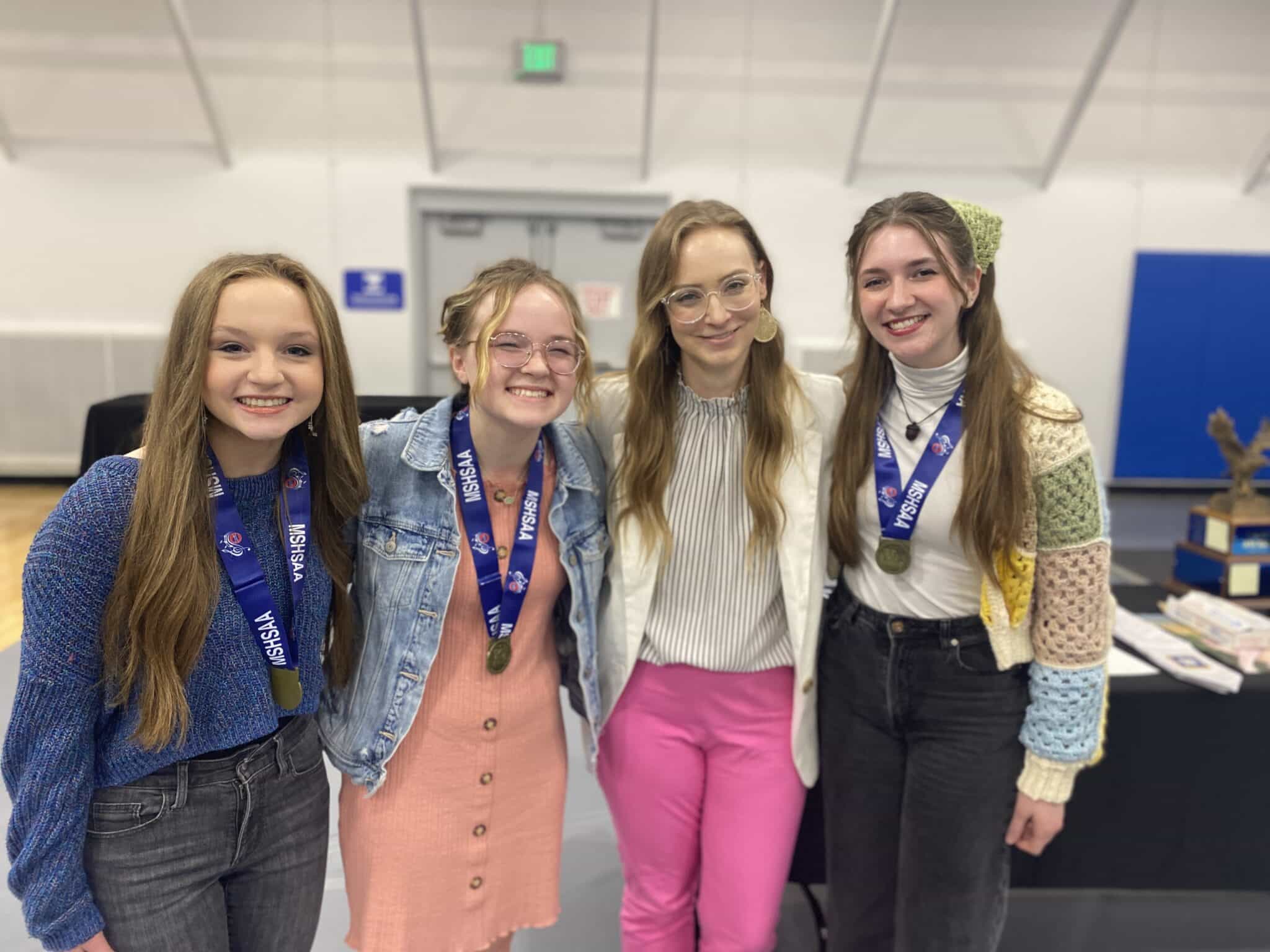 Junior Hannah Wyssmann, sophomore Addison Davies, and senior Shea Rider are pictured with SCA Secondary Vocal Music Director Mrs. Mandy Hoover. Hannah, Addison and Shea earned the highest ranking of gold as soloists at the MSHSAA State Music Festival.