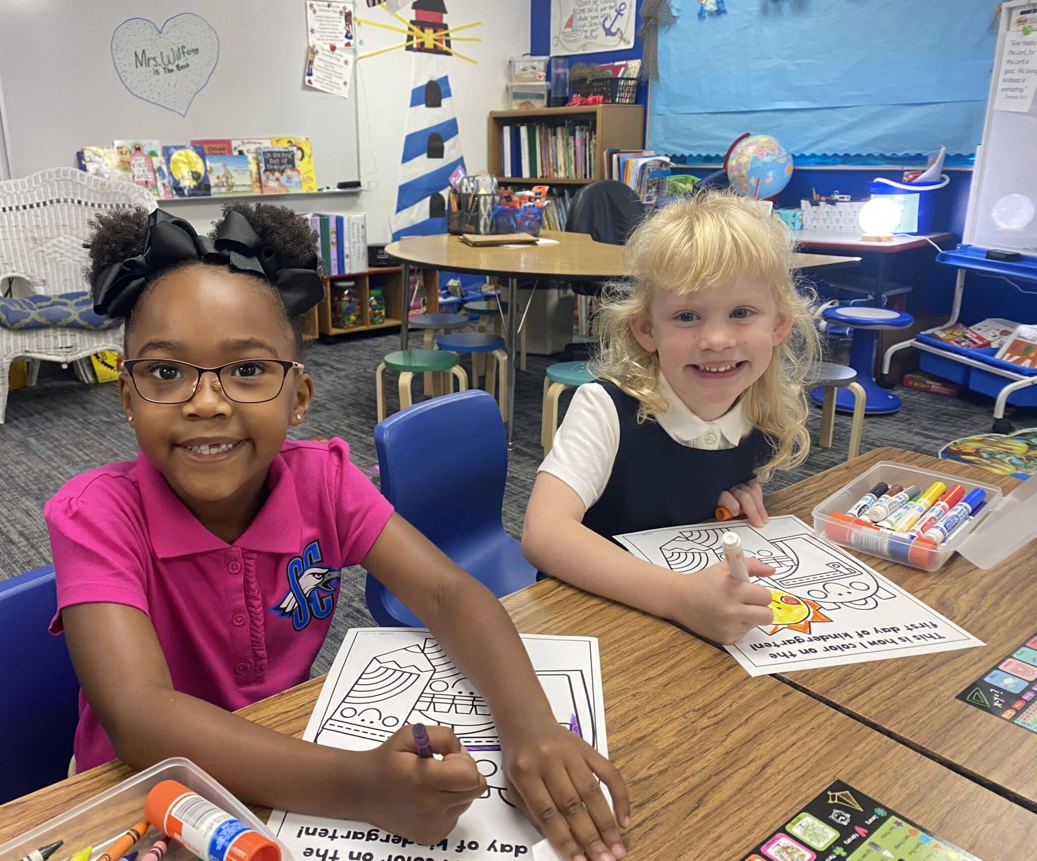 SCA students Zora Jean Paul and Olivia Jennings are all smiles on their first day of kindergarten at SCA.