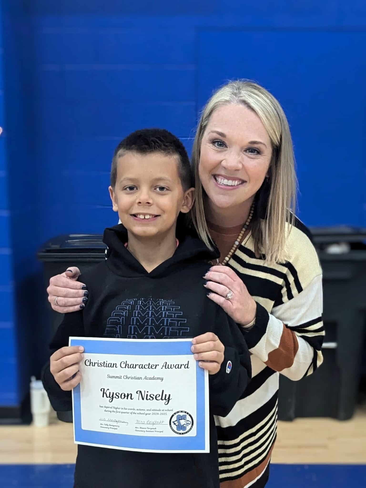 SCA third grade student Kyson Nisely, pictured with Elementary Assistant Principal Shauna Borgstadt, received the Upper Elementary Christian Character Award for the first quarter.